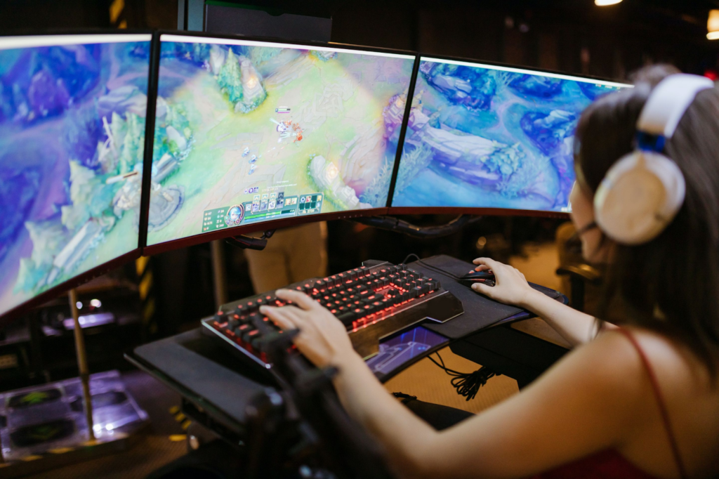 Woman playing on three screens
